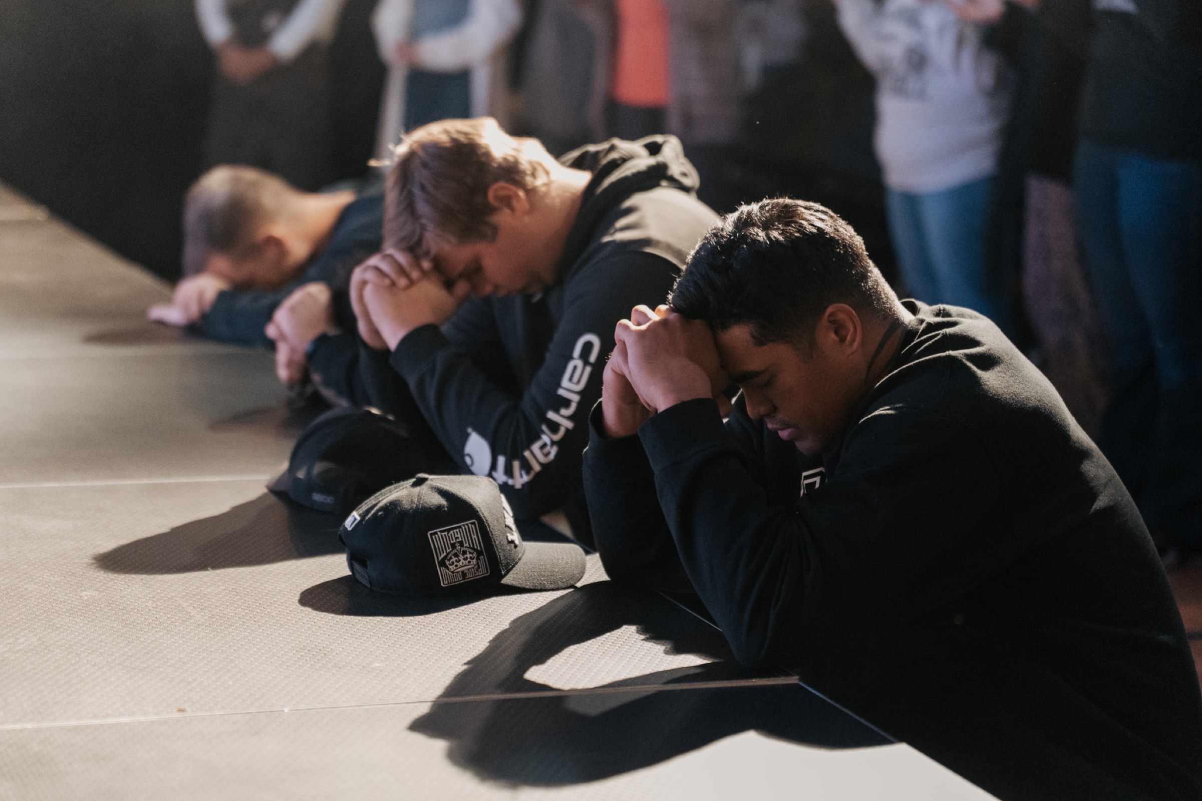 People praying together at Orbit Church