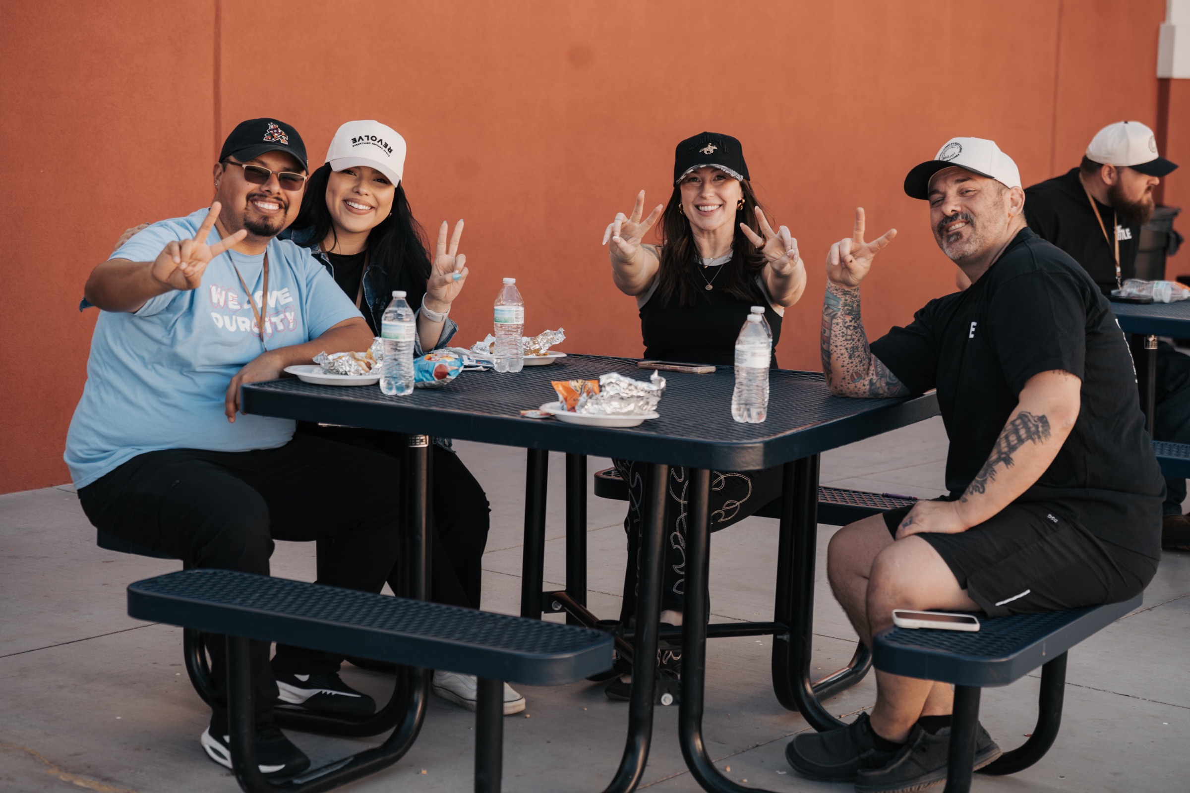 Orbit people sharing a meal and conversation around a table