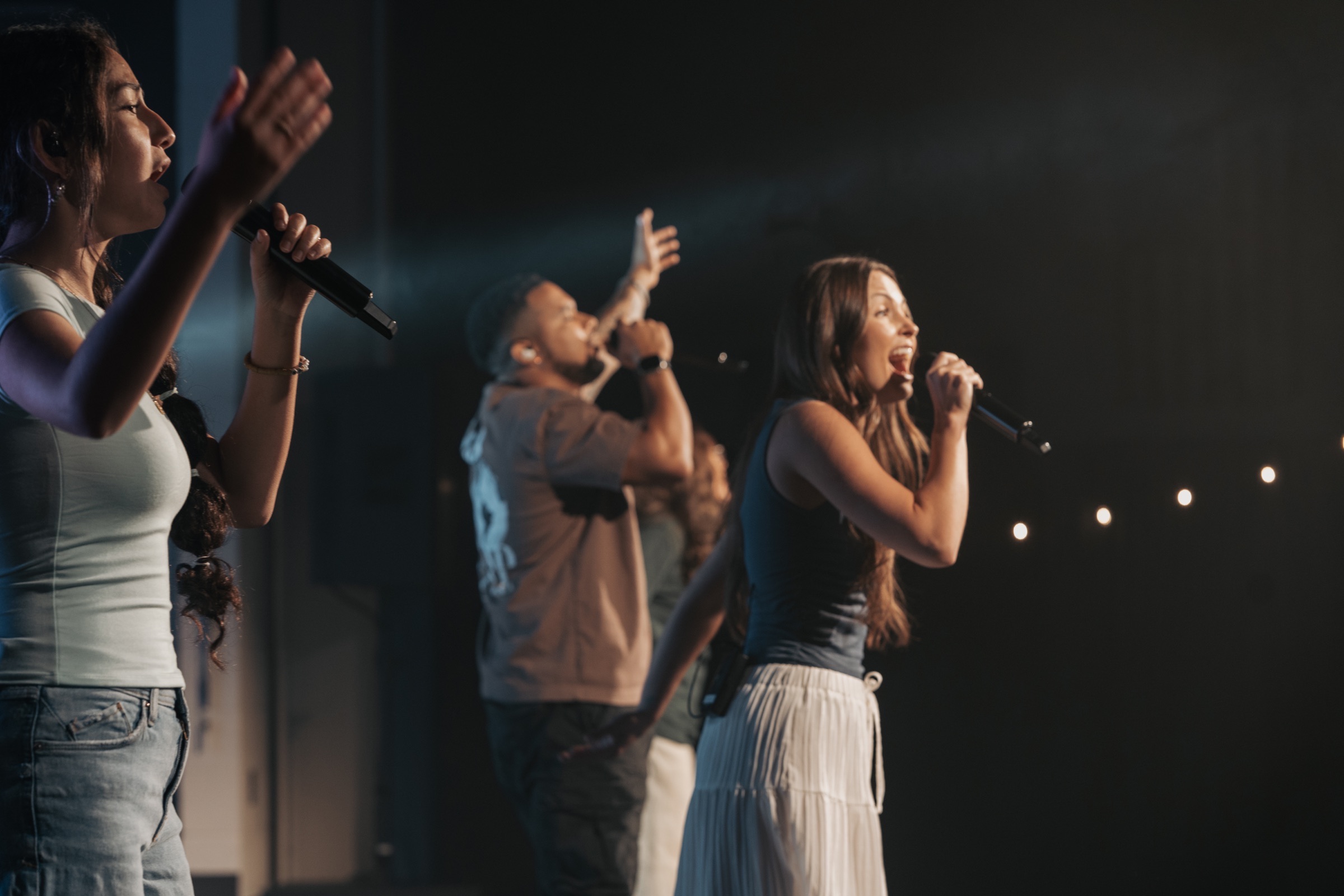 People worshiping together at Orbit Church