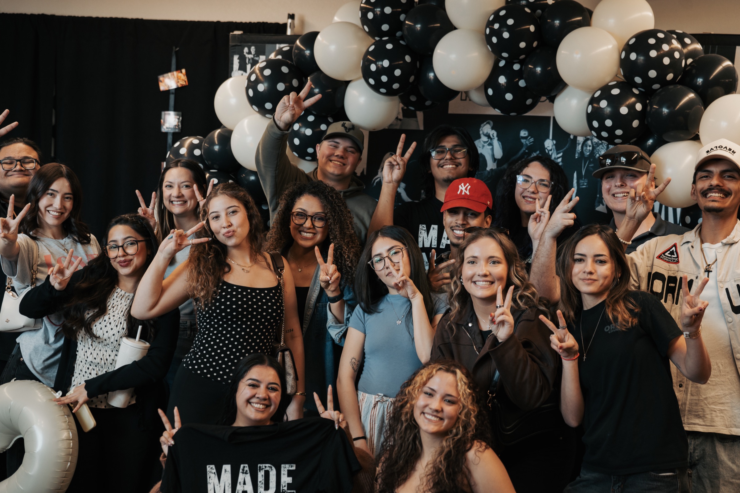 Young adults enjoying community together at Orbit Church